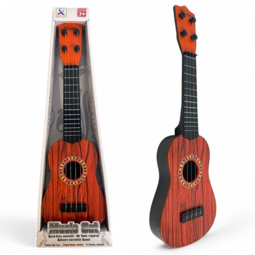 Gyermek gitár, 4 húros, 3 színben, 15x46 cm méretben.