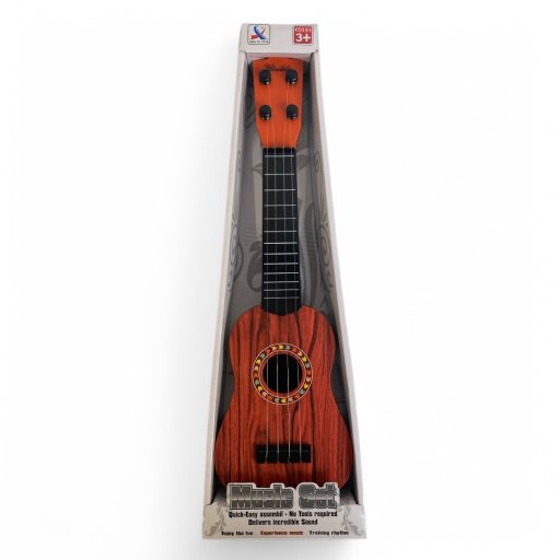 Gyermek gitár, 4 húros, 3 színben, 15x46 cm méretben.