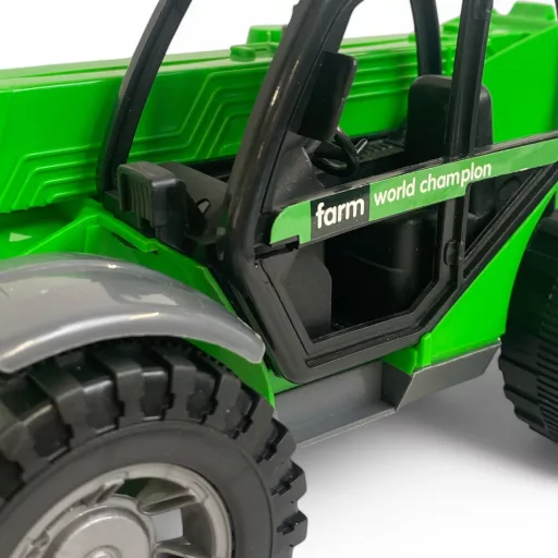 Traktor Manitou 36 cm, cserélhető szerkentyűkkel.